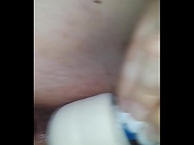 Wife does anal while playing with her wand